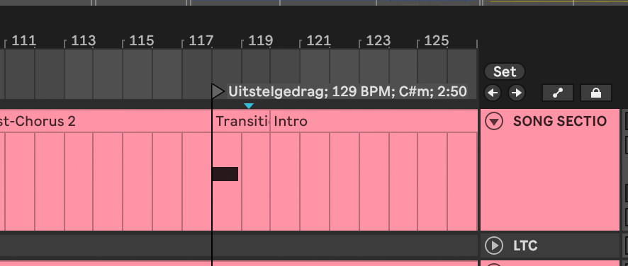 A trigger note on the timeline splitting one song from the next, with a locator naming the new song